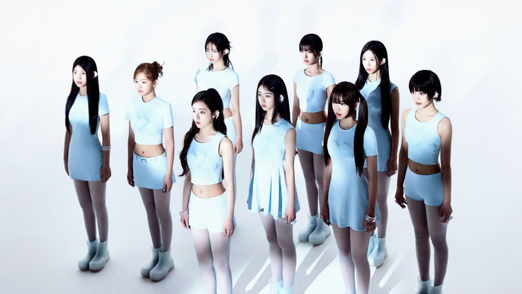 A2O LITE nine member girl group standing on stage at their debut showcase